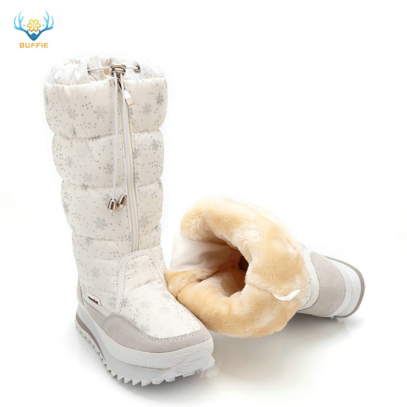 Nuevas botas altas transfronterizas europeas y americanas con copos de nieve de nueve colores, botas de nieve planas de piel gruesa de una pieza para mujer