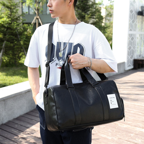New PU leather men's and women's travel bag cylindrical waterproof handbag large capacity aircraft luggage bag sports fitness bag