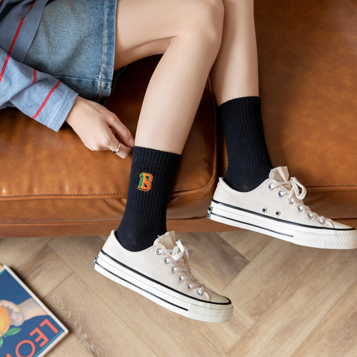 Korean Instagram trendy orange and black women's mid-calf socks with letters, streetwear skateboard style, high-waisted