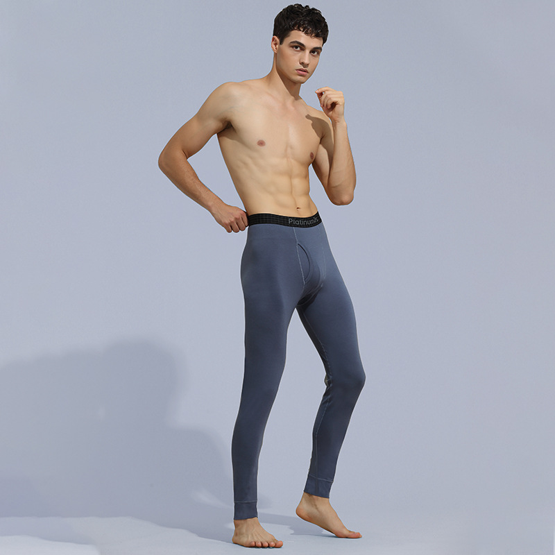 Nueva mezcla de algodón Mo otoño e invierno leggings sin costuras para hombres pantalones cálidos de color sólido delgado pantalones largos delgados