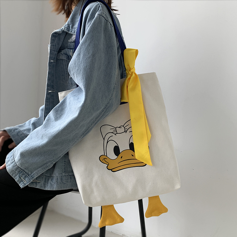 Bolsa para mujer 2020 nueva moda ins Pato y pato lindo estudiante de gran capacidad ulzzang Internet celebridad bolsa de hombro de lona