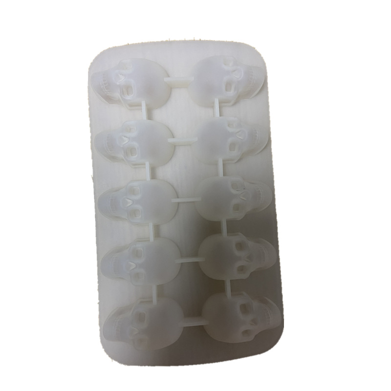 Venta directa de fábrica de diez piezas cráneo cubo de hielo Halloween 6-agujero cubo de hielo molde creativo nuevo 4-agujero cráneo cubo de hielo