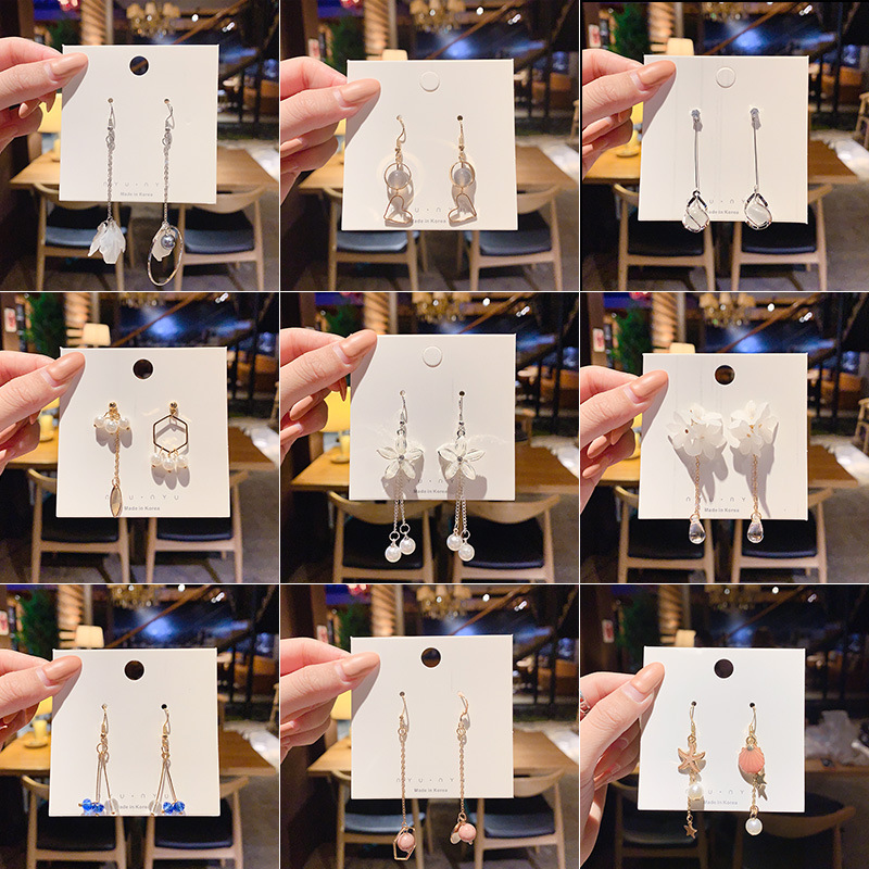 Pendientes de alta gama, estilo de otoño e invierno, moda coreana, temperamento, aretes largos con borlas, mujeres, estilo retro europeo y americano al por mayor