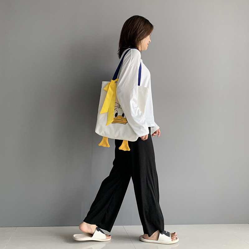 Bolsa para mujer 2020 nueva moda ins Pato y pato lindo estudiante de gran capacidad ulzzang Internet celebridad bolsa de hombro de lona