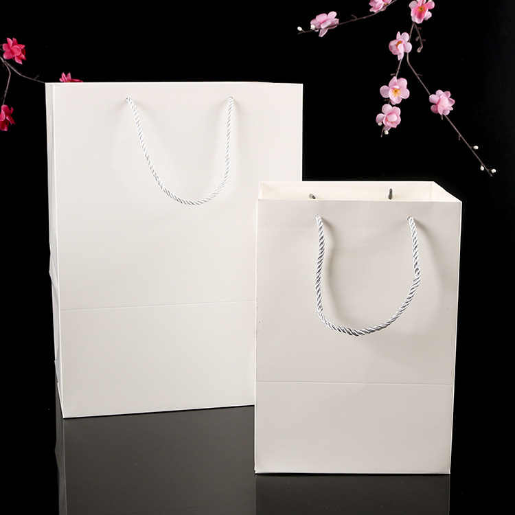 厂家纸袋定 做服装化妆品手提纸袋礼品茶叶包装购物袋定 制印logo