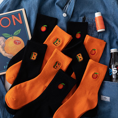 Korean Instagram trendy orange and black women's mid-calf socks with letters, streetwear skateboard style, high-waisted