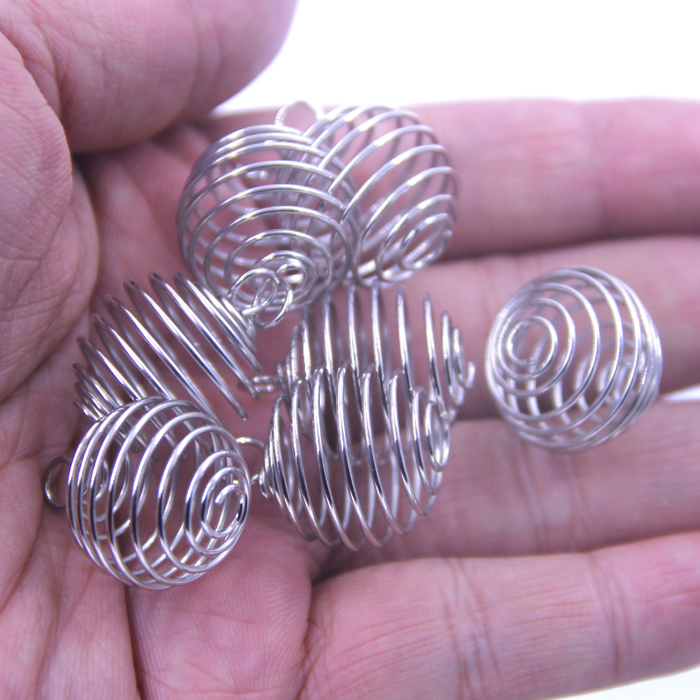 Bola de primavera accesorios de la joyería de bricolaje al por mayor colgando bola oscilante hueco Bola de agitación bola linterna colgante de primavera