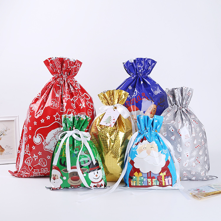 Bolsas de regalo de película láser de Amazon en stock bolsas de regalo de Navidad bolsas de dulces de embalaje de regalos creativas