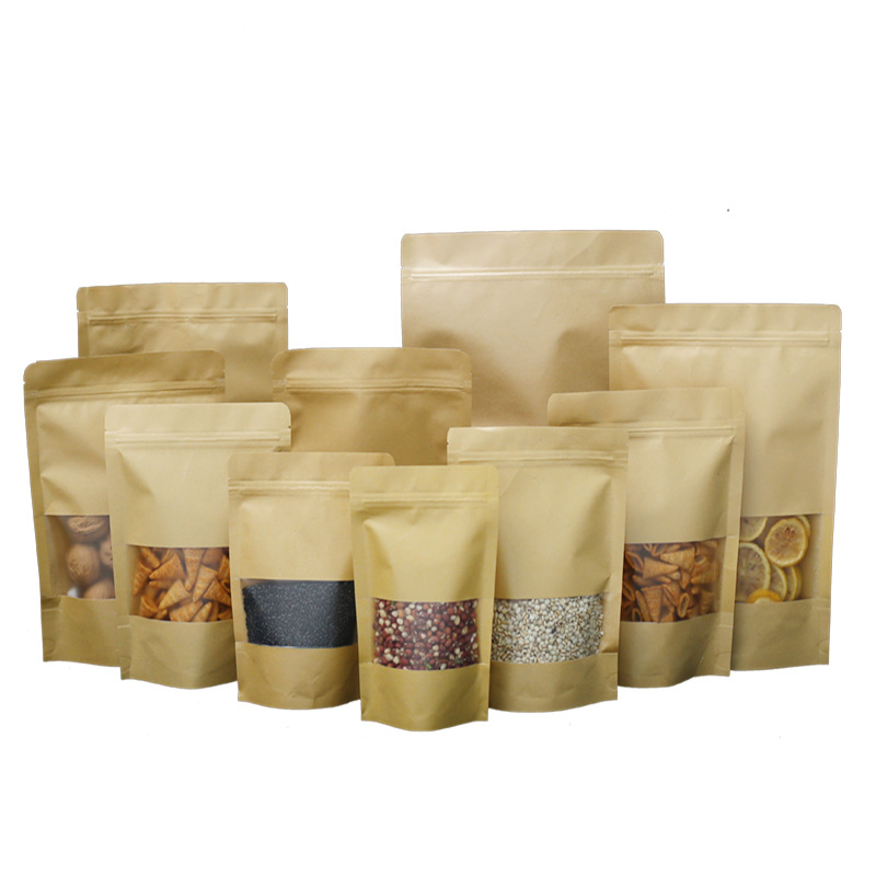 Ventana de bolsa de papel kraft engrosada autoportante bolsa de autosellado en stock bolsa de té al por mayor envasado de alimentos bolsa de plástico logo