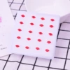 10 pairs of little red lips