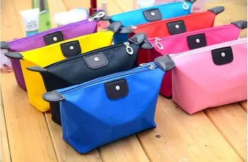 Factory direct supply hot candy color dumpling storage bag dumpling bag ingot cosmetic bag can print logo - ShopShipShake