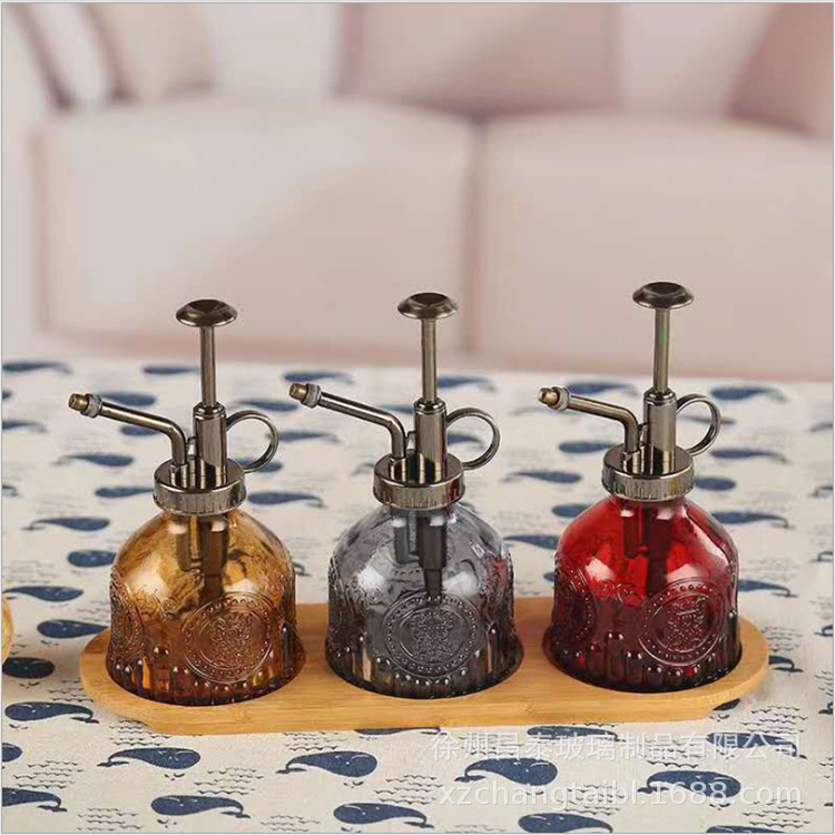 Botella de cristal en relieve regadera ducha jardinería vidrio pequeña botella de spray europeo tallado olla fábrica al por mayor