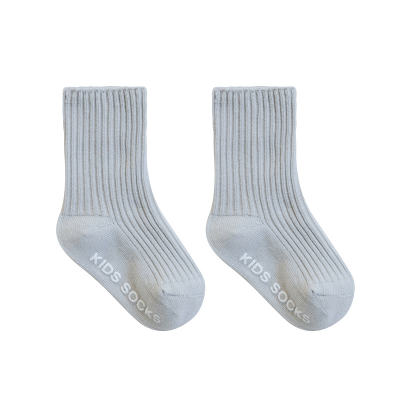 Calcetines para niños primavera y otoño aguja doble color sólido niños y niñas calcetines de algodón de media pantorrilla calcetines de bebé sin hueso calcetines de bebé cosidos a mano