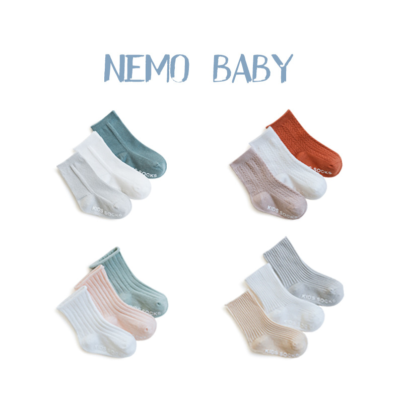 Calcetines para niños primavera y otoño aguja doble color sólido niños y niñas calcetines de algodón de media pantorrilla calcetines de bebé sin hueso calcetines de bebé cosidos a mano