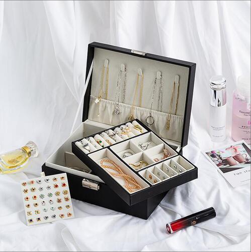 A jewelry box, double-layer jewelry organizer, multifunctional accessory storage, leather-made.