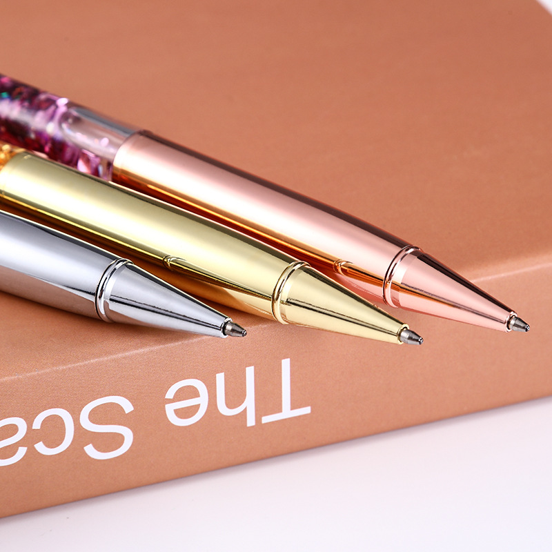 Suministro directo de fábrica pluma de cristal de aceite suspensión creativa bolígrafo Quicksand pluma metal regalo pluma publicidad pluma letras