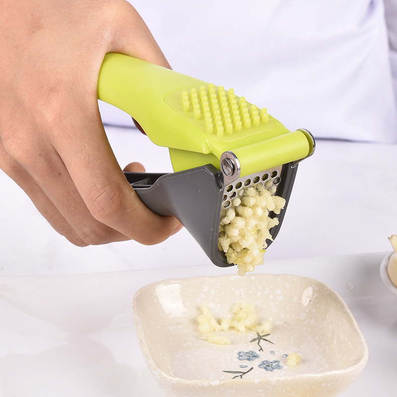 In stock Amazon plastic handle plastic garlic grinder new garlic grinder stainless steel garlic press
