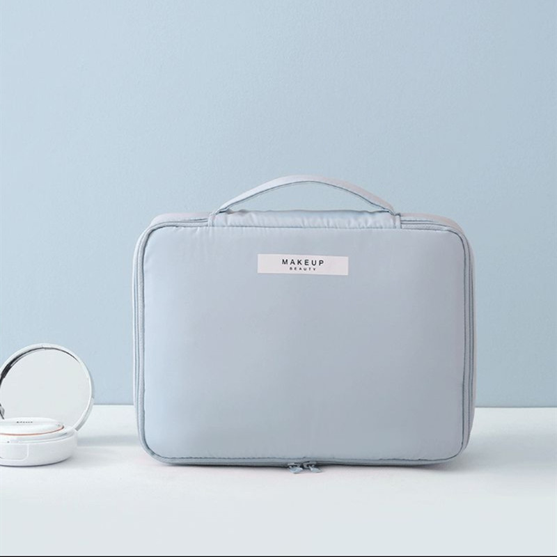 Bolsa de cosméticos ins bolsa de almacenamiento de cosméticos bolsa de lavado de viaje para mujer bolsa de cosméticos de tela portátil 2021 Nuevo
