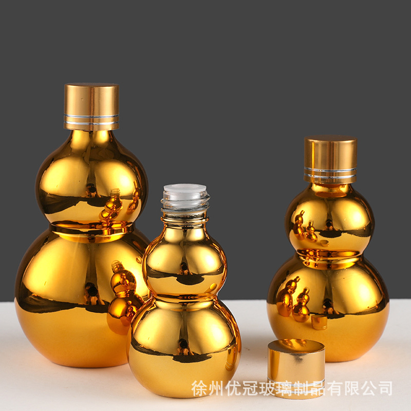 En stock suministro de galvanoplastia oro doble botella de aceite esencial de la botella vacía squeeze Spray Loción de vidrio cosmético sub-botella