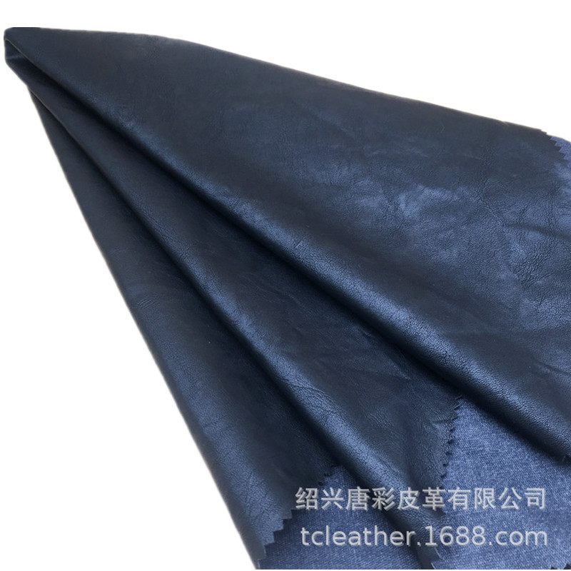工厂唐彩0.55mm厚度皮裤服装皮革面料  PU革