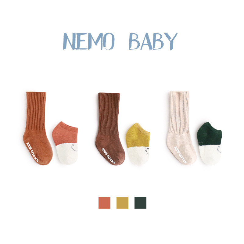 20 Otoño e Invierno nuevos calcetines para niños traje coreano lindo de dibujos animados de color sólido antideslizante media pantorrilla calcetines de bebé