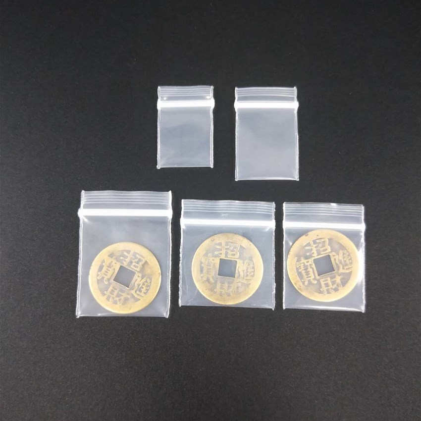 Directo de fábrica nuevo PE Extra pequeño extra grueso ziplock bolsa transparente bolsa de embalaje de polvo electrónico chip muestra bolsa al por mayor