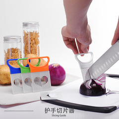 Amazon Creative Kitchen Tool Stainless Steel Onion Piercer Fruit and Vegetable Slicer Holder Protective Device