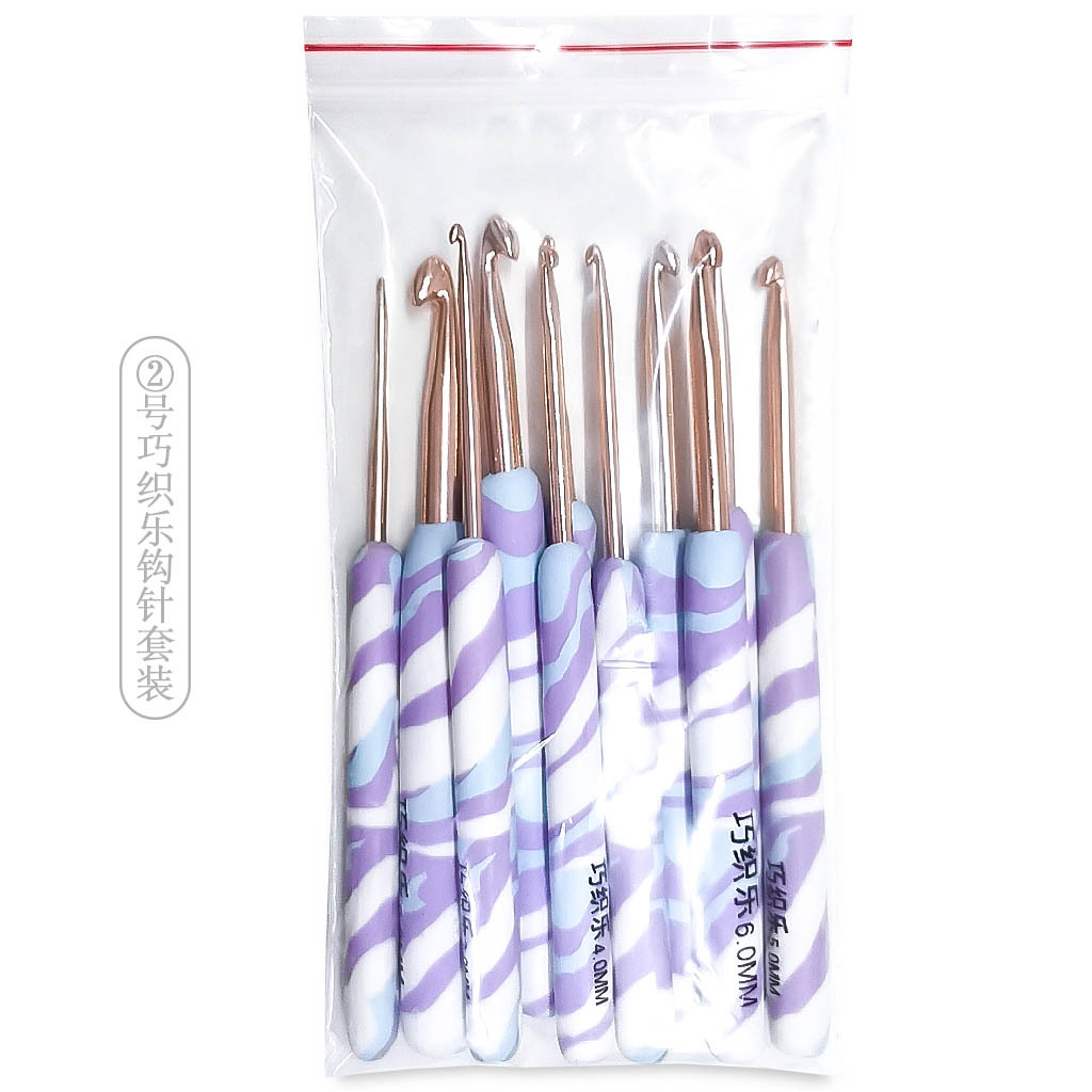 Herramientas para tejer suéteres, agujas de ganchillo de aluminio con mango de arcilla suave, agujas de ganchillo color oro rosa, juego de 11 piezas, empaque en bolsa OPP.