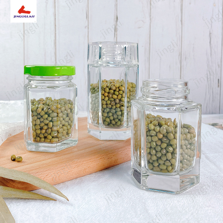 供应批发晶白料六角罐玻璃瓶，蜂蜜罐，燕窝瓶配盖
