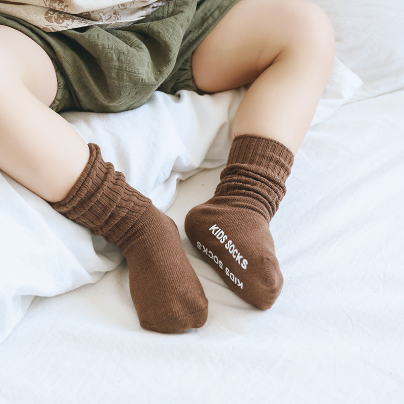 Calcetines para niños otoño nuevo color puro aguja doble antideslizante dispensación calcetines altos calcetines de bebé calcetines de algodón para bebés sin hueso