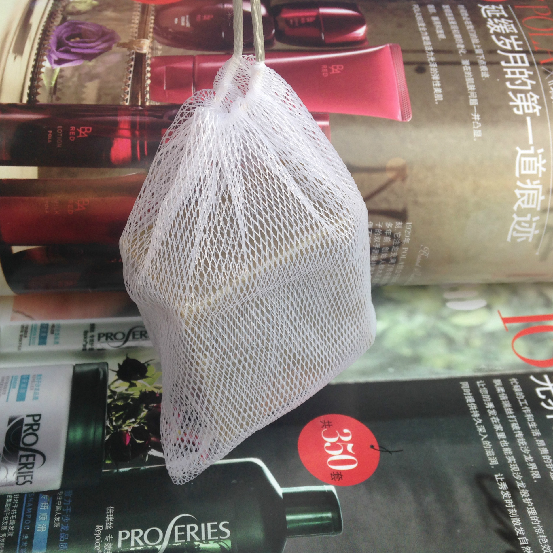 Fábrica al por mayor jabón hecho a mano neto espuma neto limpiador facial doble capa espuma estilo bolsa de red puede ser personalizado LOGO