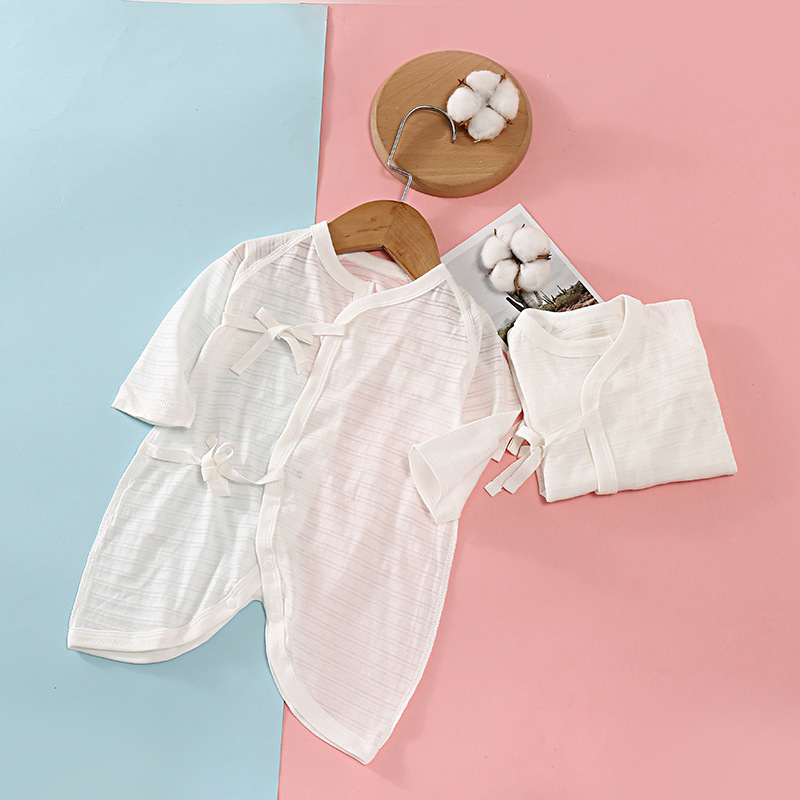 日系純白ベビー服赤ちゃん純色偏着蝶々衣和尚服新生児服a類純綿