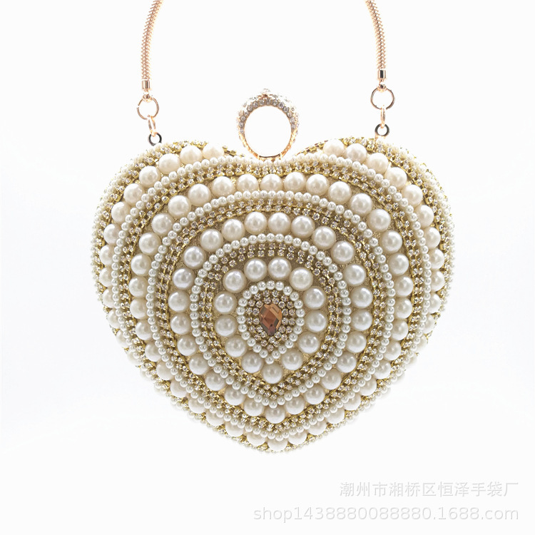 批发欧美时尚晚装包镶钻桃心化妆包手拿包质量保证