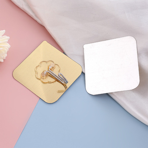 Yiwu hot selling brushed gold hook magic adhesive nail-free bathroom kitchen strong coat and hat adhesive hook manufacturer