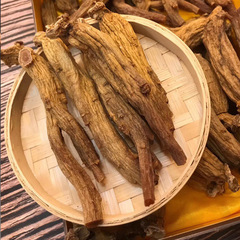 Ginseng slices from South Korea, known as "General's Shoulder with Double Root Tips," traditionally used as a health supplement, called "Heavenly Character Age" in Korean.