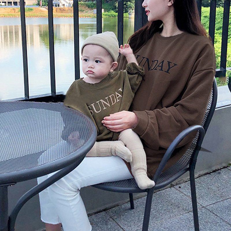 Primavera y otoño estilo coreano ropa para niños nuevo suéter niños y niñas estilo coreano carta cuello redondo moda padre-niño desgaste manga larga Top T