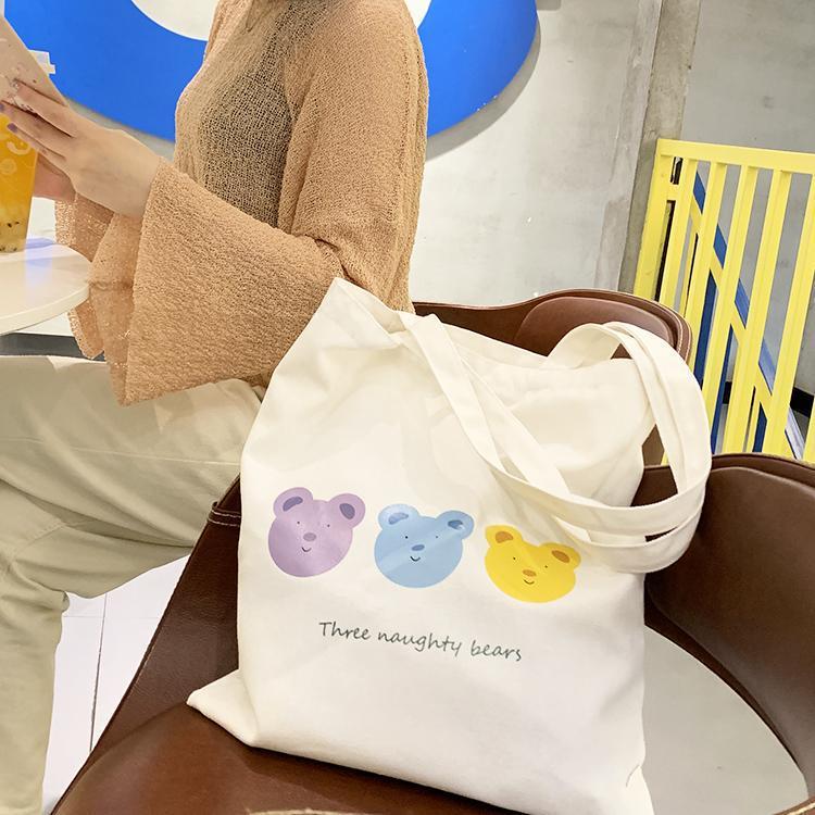 En stock bolsa de lona portátil japonés y coreano fresco artístico compras bolso de hombro estudiante bolsa de regalo puede ser personalizado bolsa de algodón