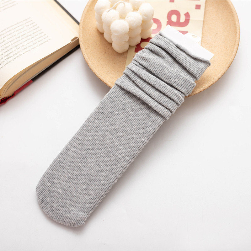 Calcetines de pila para mujer Otoño e Invierno gruesos de Cachemira delgada a rayas de color sólido calcetines de media pantorrilla de corte suelto curling calcetines de confinamiento de mujeres embarazadas