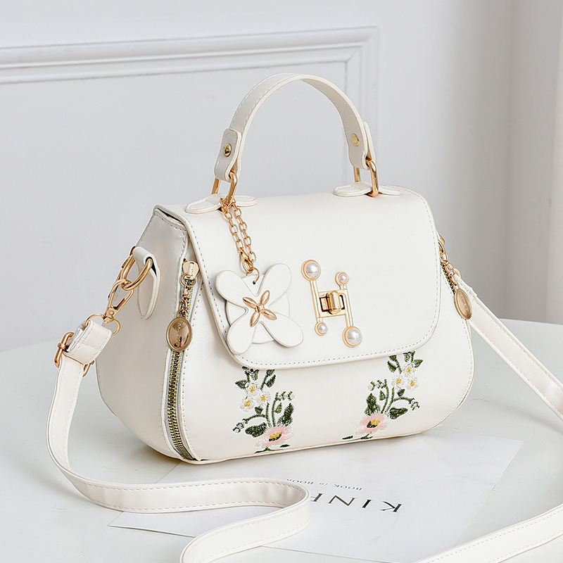 Factory wholesale women's bag 2022 autumn new fashion bucket bag embroidered bag cover shoulder messenger bag generation hair
