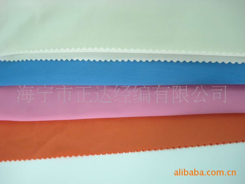 厂家直销针织经编涤氨丝光平布经编大有光莱卡氨纶低克重120G面料