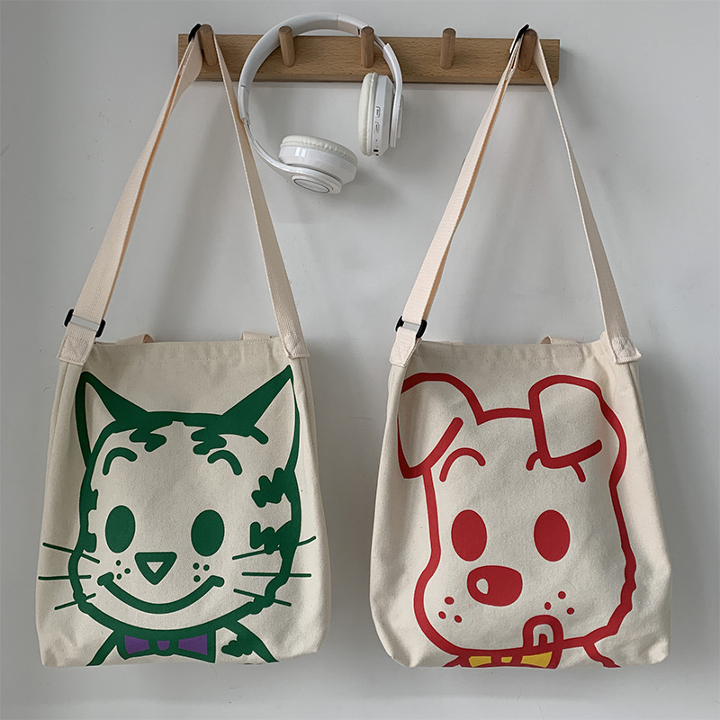 Bolso de lona bolso cruzado para mujer 2025 nuevo estilo estilo japonés versátil bolso de hombro de dibujos animados de gran capacidad bolso de tela para estudiantes estilo k