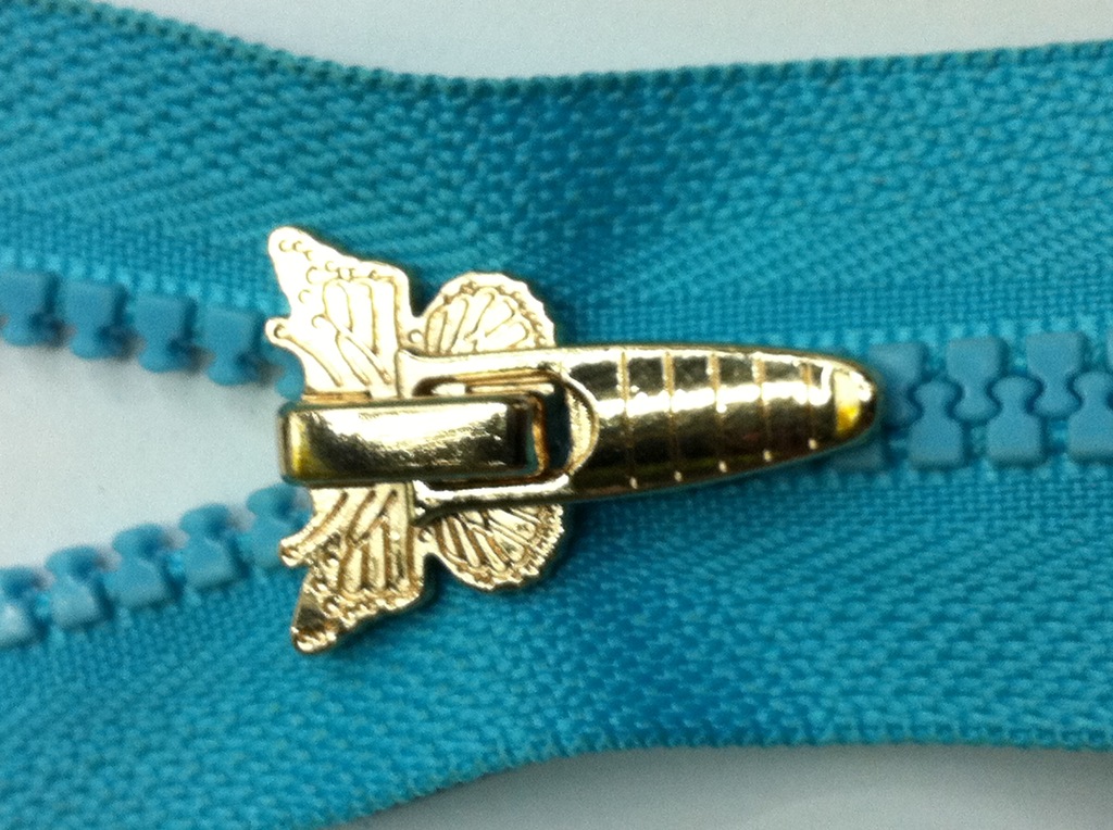 【伟兴辅料】提供蝴蝶拉链头单头服装用拉链扣拉绳