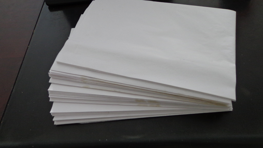厂家低价供应包服装用空白防潮纸【可印刷logo】