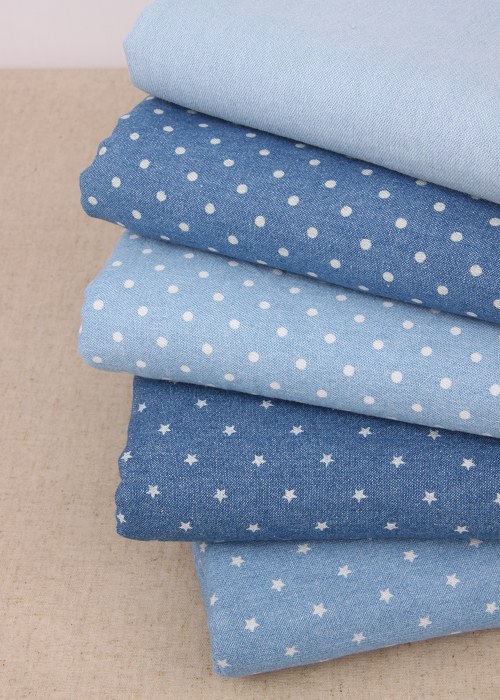 ファッションの薄いデニムの生地のスカートのプリントの星の丸い点の薄い色の水洗いの綿のデニムの卸売り