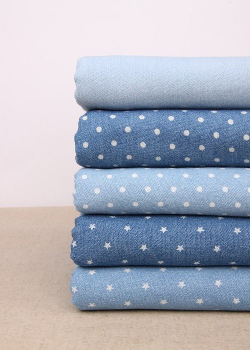 ファッションの薄いデニムの生地のスカートのプリントの星の丸い点の薄い色の水洗いの綿のデニムの卸売り