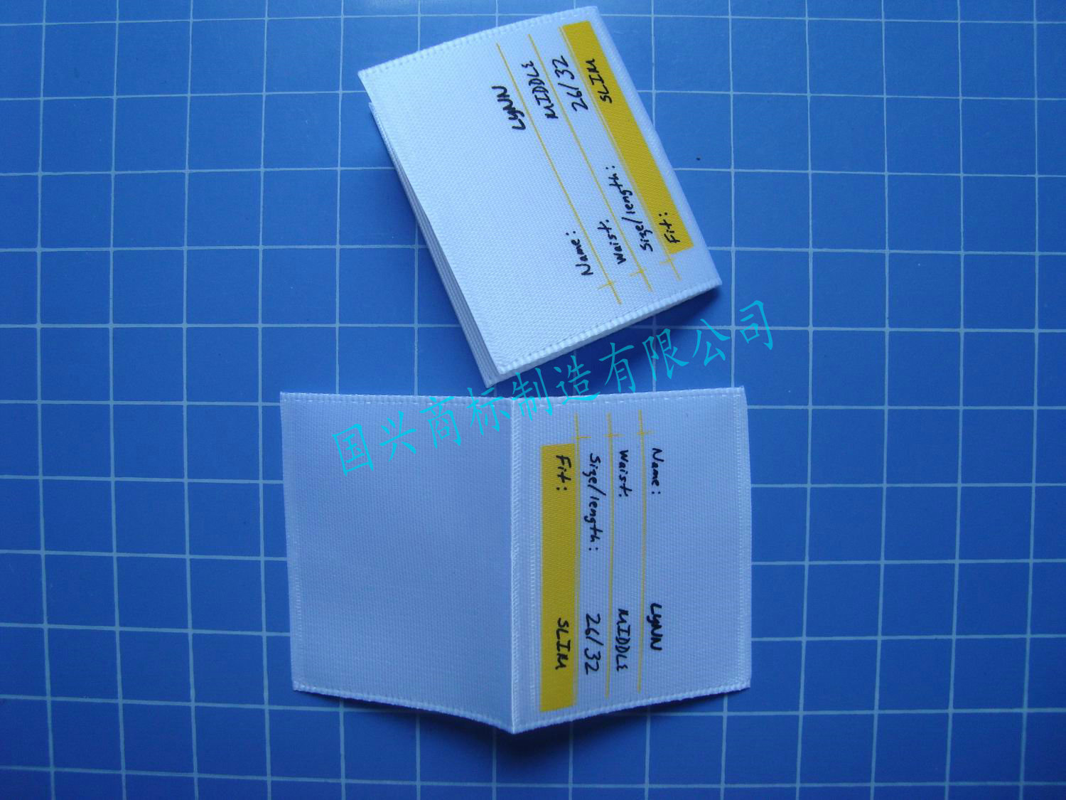 火爆优惠中 免费设计   优质工装制服布标、侧唛布标