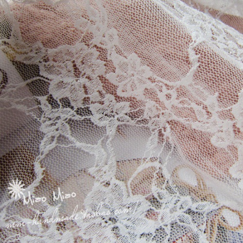 服装纺织布料 弹力白色刺绣雕花纹镂空蕾丝 通花提花朵背心面料