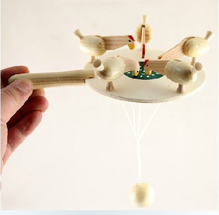 Wooden Chick Feeding Toy