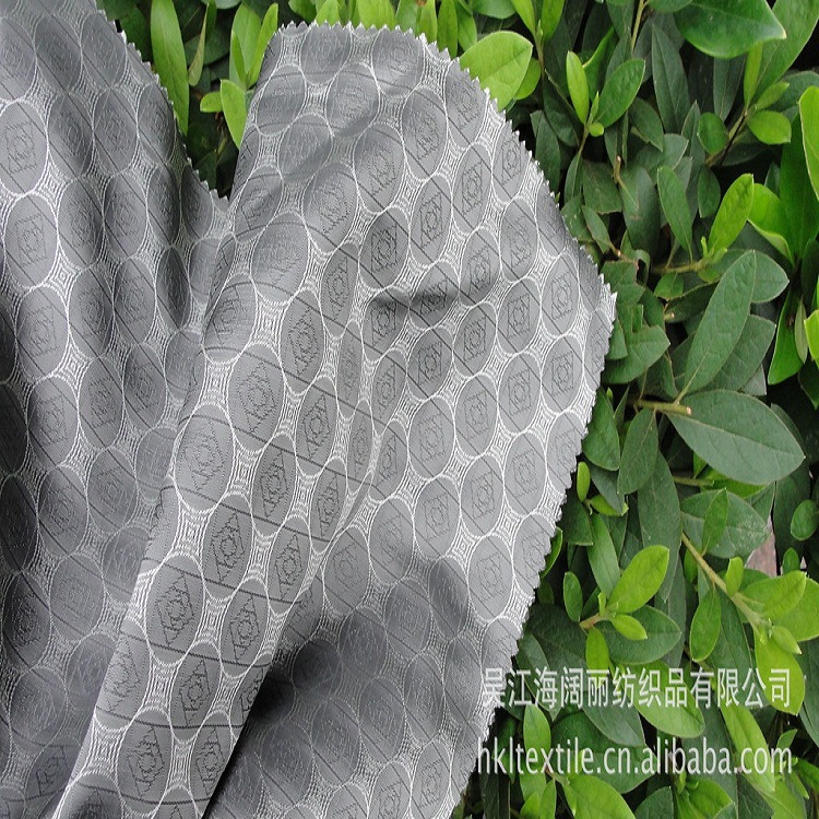 现货经典西服里里料人丝提花布定 制秋冬用几何提花服装用布提花