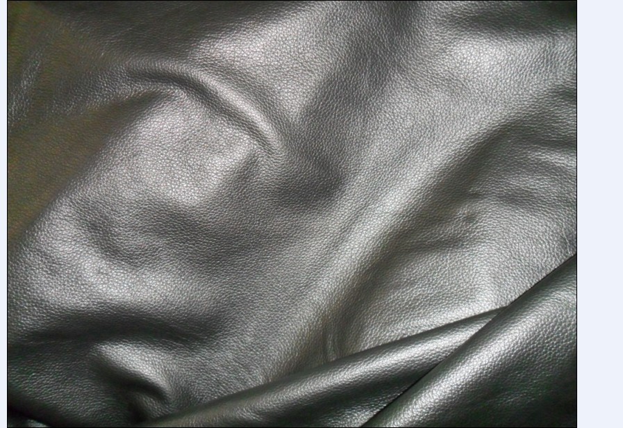 头层真皮 黄牛皮 黑色荔枝纹牛皮 服装革牛皮